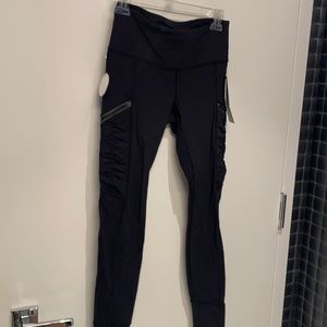 Lululemon Train in the Rain Tights. Size 6. New with tags
